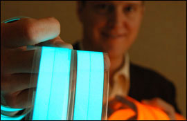Picture of a Man Holding Glowing Tape